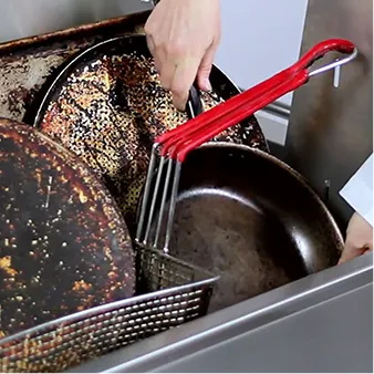 Loading the FOG Tank with dirty dishes.